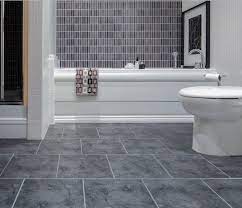 Since they come in large sizes, you can install sheet flooring with few to zero seams in a regular bathroom. Grey Vinyl Sheet Flooring Grey Bathroom Floor Gray Tile Bathroom Floor Ceramic Tile Bathrooms