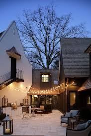 Fairy lights above kitchen cabinets. Patio With Fairy Lights And Outdoor Kitchen Transitional Deck Patio