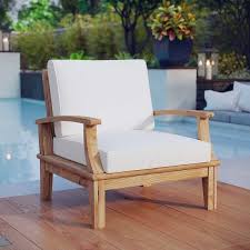 Crafted From Teak Wood And Showcasing Water Resistant Cushions This Understated Patio Arm Chair Is A Charm Teak Patio Furniture Teak Outdoor Patio Furnishings