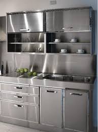 The modern metal kitchen cabinets are easy to clean and maintain their lustrous looks so that the kitchen sustains a welcoming and homely feel. Metal Kitchen Cabinet Retro Metal Kitchen Cabinets Metal Kitchen Cabinets Steel Kitchen Cabinets Aluminum Kitchen Cabinets