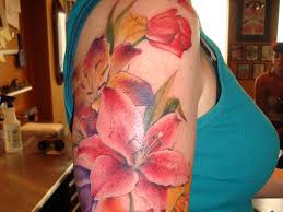 Calla lilies come in many vivid colors which can brighten a tattoo design. 24 Stargazer Lily Tattoos Which Are Completely Different Slodive