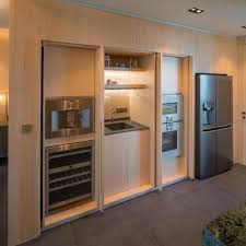 Keep your kitchen cabinets up to date with a modern makeover. Progetto Penthouse Singapore Laurameroni