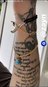 The socialite posted an instagram carousel of the moment with the caption, i tattoo. the first image pictures the couple seated at a table as kardashian takes a tattoo pen to barker's right forearm. 90 Celebrity Tattoos We Love Cool Celeb Tattoo Ideas For Inspiration