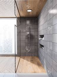 Whether your style is traditional or contemporary, modern or retro, these versatile bathroom tiles are impervious to water and come in an array of colors, styles and textures. Modern Gray Wooden Tiled Wall Bathroom Interior With Gray Floor Stock Photo Picture And Royalty Free Image Image 107015106