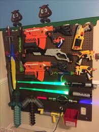 I saw this online and his friend has a similar rack for nerf. Storage Ideas Nerf Gun Storage Ideas