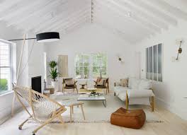 The shape of the lamp reminds a stylized flower or even the reaction of liquid the impact of a drop of water. Photo 1 Of 5 In How Much Should You Spend On A Living Room Sofa From A Hamptons Beach Retreat Gets A Scandinavian Style Makeover Dwell