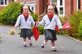 Adorable Identical Twins With Down S Syndrome Celebrate Their First Day At School Mirror Online