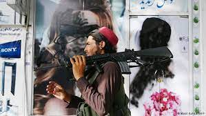 Still image from video obtained from social media shows a horde of people running toward the kabul airport terminal on august 16, 2021 in the wake of taliban insurgents regaining power in afghanistan. S3pdjl9h Neobm