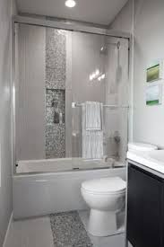 This stunning white bathroom is made modern by its minimalist styling. 260 Bathroom Tiles Ideas Small Bathroom Bathrooms Remodel Bathroom Inspiration