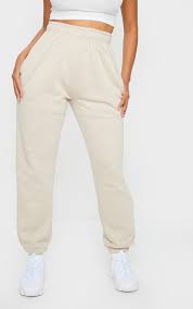 Il présente une taille haute. Shape Jogging Gris Pierre A Taille Haute Et Poches Prettylittlething Fr