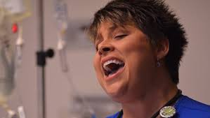 Nurse at Mary Black Hospital sings to patients