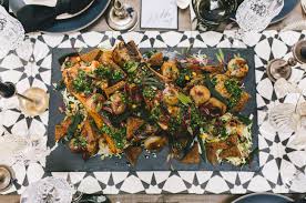 Whether you're hosting the entire block for a ghastly fun party or simply having a few souls over for a smaller fête before heading out, food is at the heart of halloween fun. How To Throw A Black White Halloween Dinner Party Green Wedding Shoes