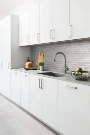 We loved the shade of the gray in this grey shaker kitchen cabinet! Modern Light Gray Subway Backsplash Tile Contemporary Design Grey Kitchen Tiles Modern Kitchen Backsplash Mosaic Backsplash Kitchen