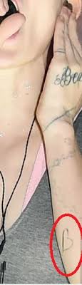 I've been getting tattooed since i was 15 years old and i'm excited to finally share about the tattoos i've collected over the years because they all mark. Grimes Musician 16 Tattoos Their Meanings Body Art Guru