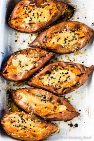Baked Sweet Potatoes With Miso Tahini Butter Recipe Sweet Potato Recipes Roasted Roasted Sweet Potatoes Oven Roasted Sweet Potatoes
