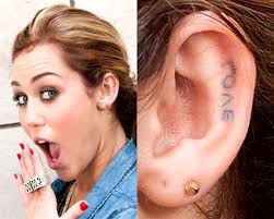 From large, intricate ink to dainty little tats, the younger now singer has them all. Miley Cyrus Tattoos Small Tattoos For Guys Tattoos For Guys Tattoos
