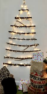Now, for this tree, i let the center stick hang down below the tree shape and used it as the trunk of the tree. Simple Twig Christmas Tree You Can Make In 30 Minutes The Mummy Front