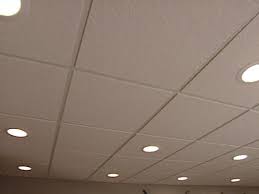 A Drop Or Suspended Ceiling Offers A Way To Both Conceal And Provide Access To Electrical And Plumbing Dropped Ceiling Drop Ceiling Lighting Basement Ceiling