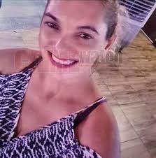 This is the woman who was found hanging at Carli Bay. She has been  identified as Sherryann Roet. Roet was discovered hanging from a rope tied  to a tree at Carli Bay