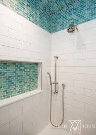 Gorgeous Blue And White Walk In Shower Is Clad In Turquoise Blue Glass Ceiling Tile Bathroom Best Bathroom Tiles Subway Tiles Bathroom