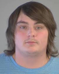 Four men charged after burglary at home near courthouse