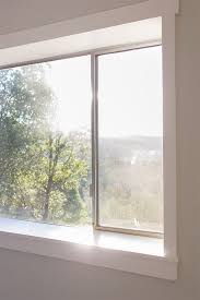 Scrape off all the old caulk and any other debris that's hanging around. Master Makeover Trimming Out The Window