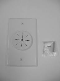 It's about 4 inches across and about an inch across. Single Gang Bulk Cable Wall Plate With Grommet White Hole Style