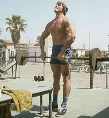 Arnold pumping iron at the beach. Love old school pics like this. Monday  motivation : r/bodybuilding