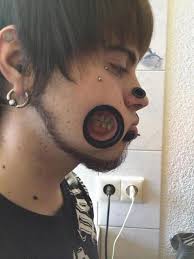 Body modification includes tattoos, piercings, and other alterations to the body. Improving Nature The World Of Extreme Body Modification
