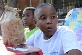 Detroit boy, 9-year-old Joshua Smith, sells lemonade to help his city ease  financial woes