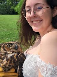 The barn babies are both feeding themselves! Baby red started picking up  pieces of food the other day and has mastered the art of being a big bad  scary owl capable of