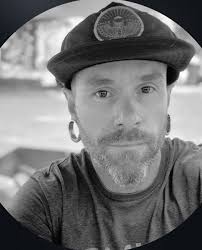 Kenny Harton. On his way to Perth Australia. Extremely dangerous. Beats and  grapes women. Beats children. Doesn't have custody of his child and is