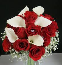 Wedding bouquets red roses and white lilies. Kim And Company