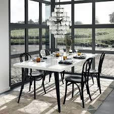 The chair that was once relegated to the cobblestone sidewalks of paris has now arrived inside many. Buy Nordal Bistro Chair Shiny Black Amara