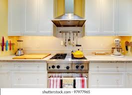Fx cabinets warehouse is a cabinet wholesaler offering premium quality kitchen cabinets at our experienced kitchen designers will help you narrow down what is the best choice for your home. Narrow White Yellow Kitchen Cabinets Close Stock Photo Edit Now 97977965