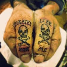 Drink up me 'hearties lyrics: Pirates Tattoos Thumb Tattoos Pirate Tattoo Knuckle Tattoos