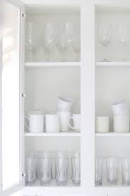 How To Style Glass Front Kitchen Cabinets Thistlewood Farm Glass Kitchen Cabinets Glass Fronted Kitchen Cabinets Glass Cabinet Decor