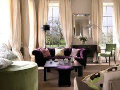 This rich, purply color, paired with black, makes for a dramatic space that still retains a bit of warmth. 87 Purple And Green Livingroom Ideas Decor Purple Living Room Home Decor