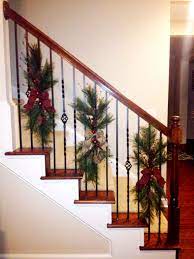 Christmas Swags Tied To Stair Railing Instead Of Wrapping Garland Around The Bani Christmas Staircase Decor Christmas Stairs Decorations Simple Christmas Decor