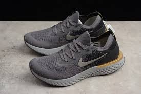 Nike epic react flyknit black and gery printing men's and women's size running shoes. Nike Epic React Flyknit Grey Black Gold Running Shoes Free Shipping Sportaccord 2021