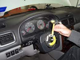 This should ease the tension on the steering column and allow you to turn the key. Steering Wheel Lock Disable Remove Subaru Forester Owners Forum