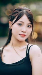 I bumped into Greta weeks ago and was instantly struck by her cool outfit  and accessories. I just had to walk up and ask her for a portrait, and  luckily, she was