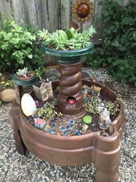 Repurposed Water Table Into A Fairy Garden Sand And Water Table Kids Fairy Garden Kids Water Table