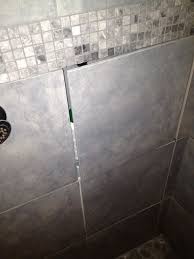 Hidden Storage For Shower Stuff From Owner The Door Is Made From A Piece Of Tile That Is Attached To Another Piece Of T Master Bathroom Hidden Shower Bathroom