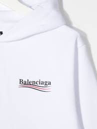 Back to the genuine balenciaga hoodie, you can notice how its country of manufacturing's block of text looks a bit thicker and more defined when put moving forward to the third way on how to spot fake balenciaga hoodies, we are now going to look at the little tab which indicates the size of the fake vs. Unisex Kid White Hoodie With Political Campaign Logo Balenciaga Kids Russocapri