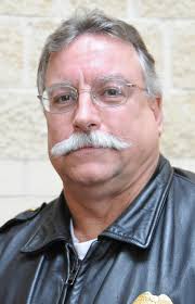 Amherst Police chief Lonnie Dillon, left, North Ri…