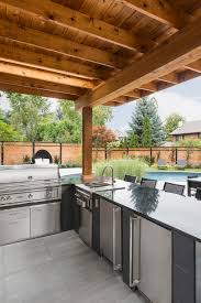 beautiful covered backyard kitchens