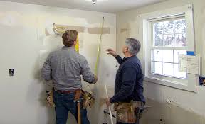 Use wire hangers to hang heavy frames. How To Install Kitchen Cabinets The Home Depot