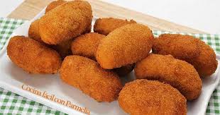 Croquetas De Arroz Y Queso Estas Croquetas De Arroz Y Queso Son Perfectas Para Aquellas Mamas Que No Tienen Mucho Tiempo Croquetas Arroz Croquetas De Calabacin