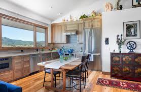 A herringbone hardwood floor brings some pattern to the space and grounds the room with a touch of rich color. 75 Beautiful Vaulted Ceiling Kitchen Pictures Ideas June 2021 Houzz